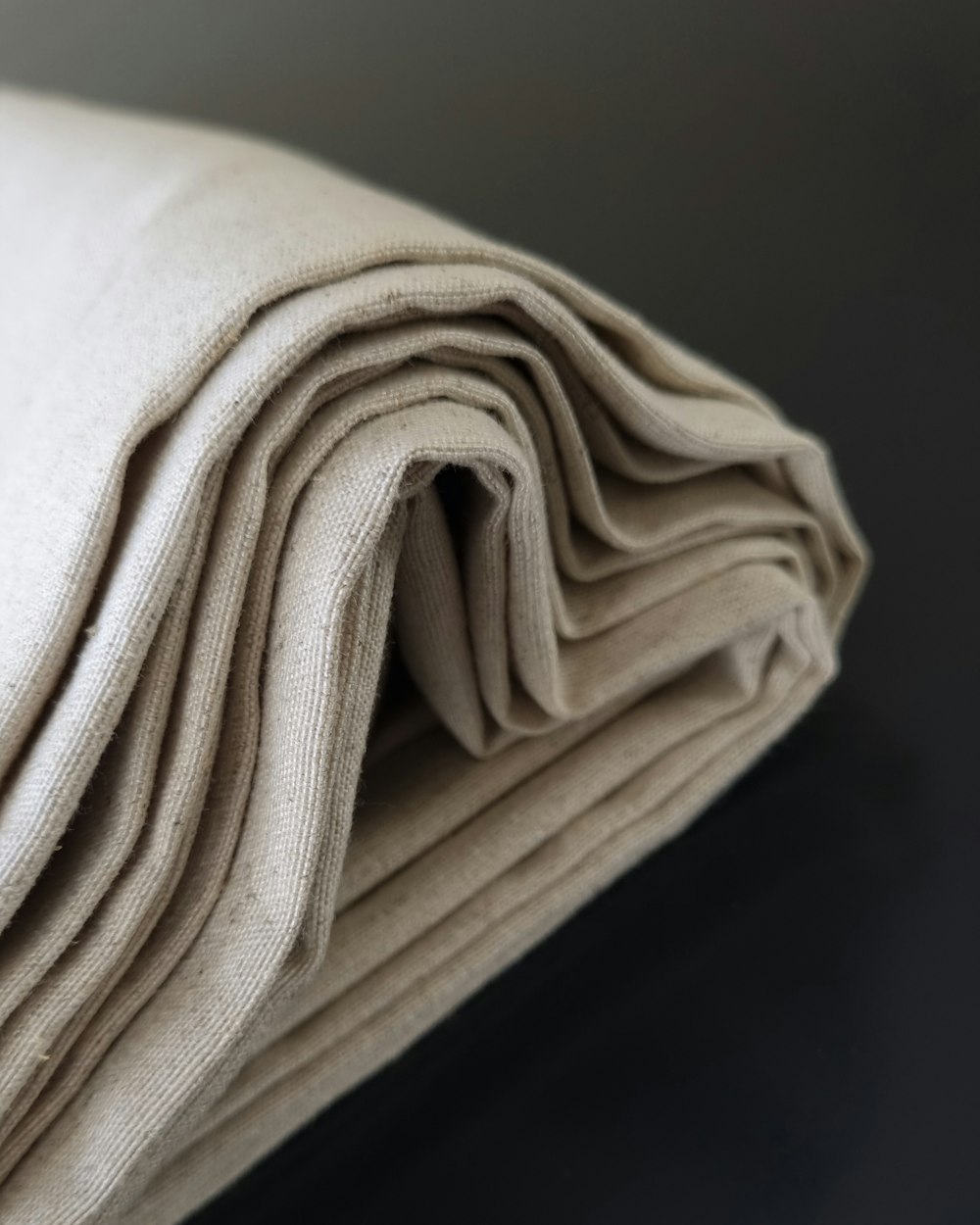 Tissu en coton naturel plié